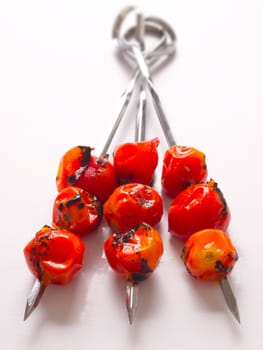 close up of cherry tomato skewers