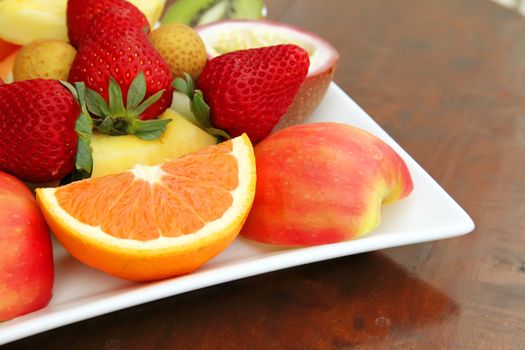 Fresh Fruits Sliced and Assorted on a Plate