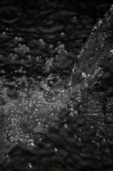 closeup of water splashing with lots of bubbles