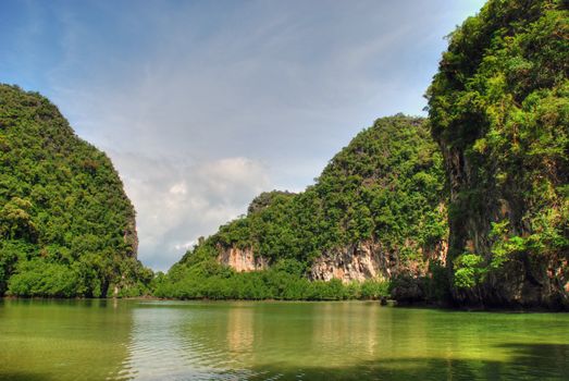 Detail of a Thailand Island with water and vegetation