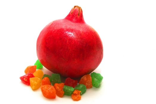 photo of the ripe pomegranate on white background