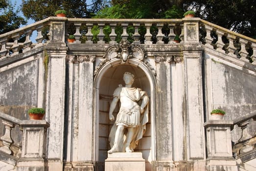 antique staircase and statue in Ajuda garden in Lisbon, Portugal