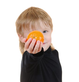 The cheerful child with orange isolated on white background