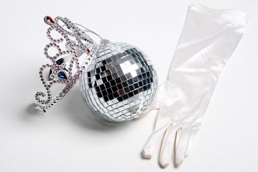 What every prom party should have, disco ball, jeweled tiara and some fancy clothing