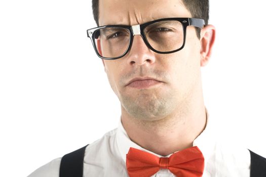 A young, caucasian nerd, close-up, isolated on a white background.