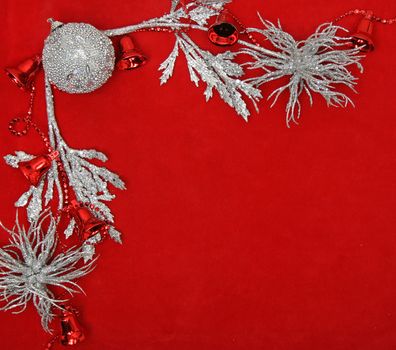 Silver and red christmas decorations with copyspace