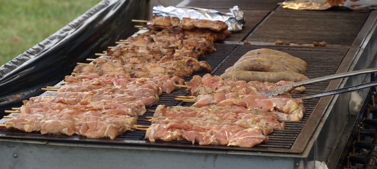 food on the grill at a local fair