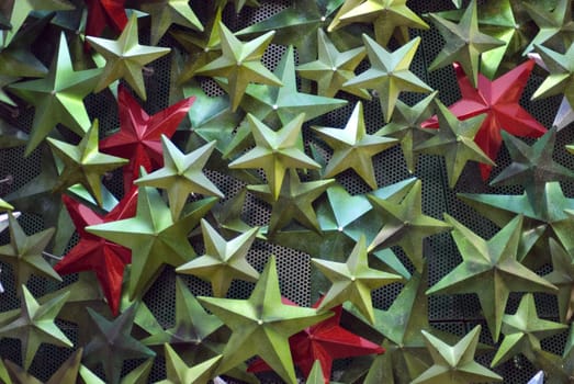 an assortment of festive decorations in metallic green red and white