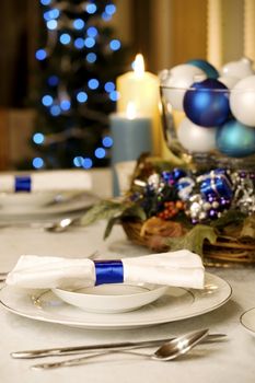 Elegant blue and white Christmas table setting