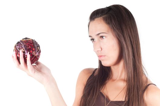 Studio shot of brunette woman with christmas decoration