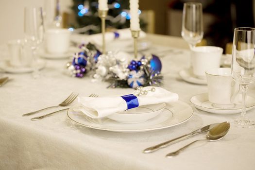 Elegant blue and white Christmas table setting