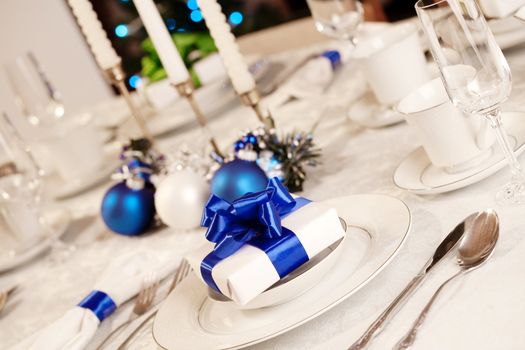 Elegant blue and white Christmas table setting
