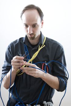 a clueless network technician looking at wires