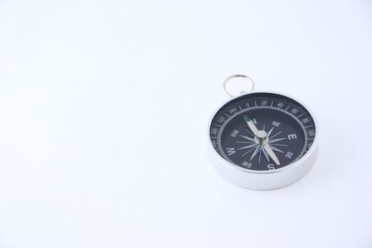 Compass on a white background removed close up. Not isolated