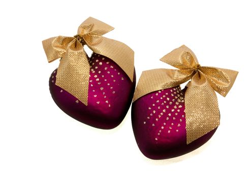 A picture of two violet Christmas hearts