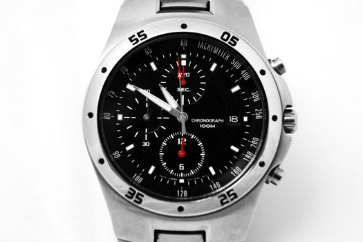 Close up of a men's watch isolated against white