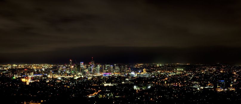 Wide panoramic shot of Brisbane on an overcast night