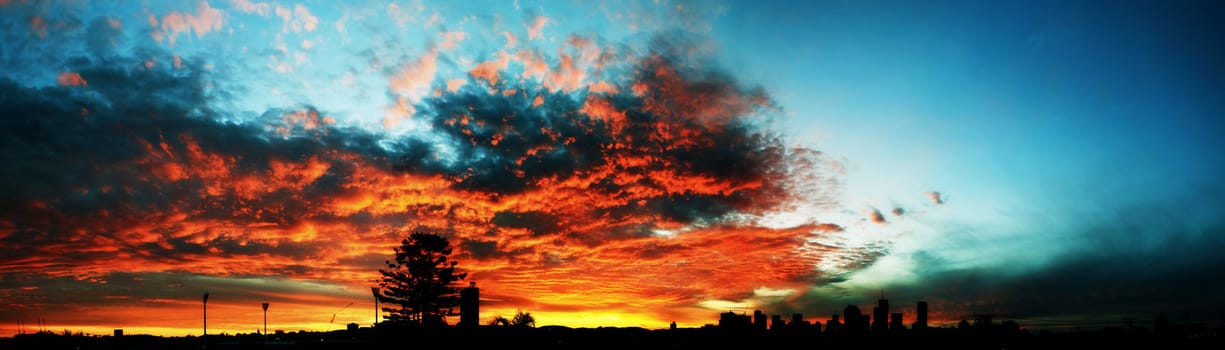 Firey sunset over Brisbane panorama