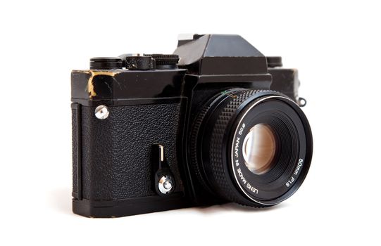 Shot of a vintage 35mm SLR camera isolated against white