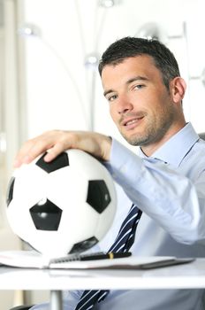 Business man with football