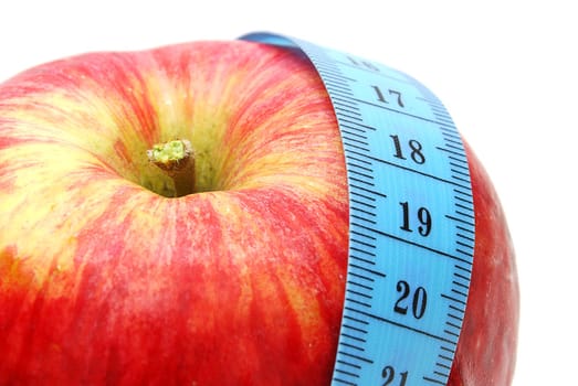 Red Apple with Measure Tape on White Background