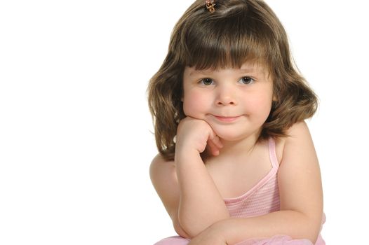 The lovely little girl close up. It is isolated on a white background