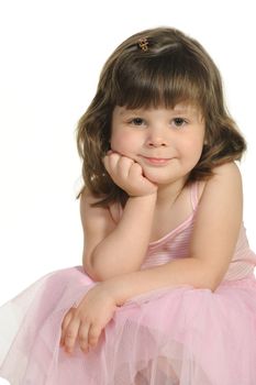 The lovely little girl close up. It is isolated on a white background