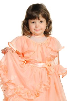 The lovely little girl close up. It is isolated on a white background