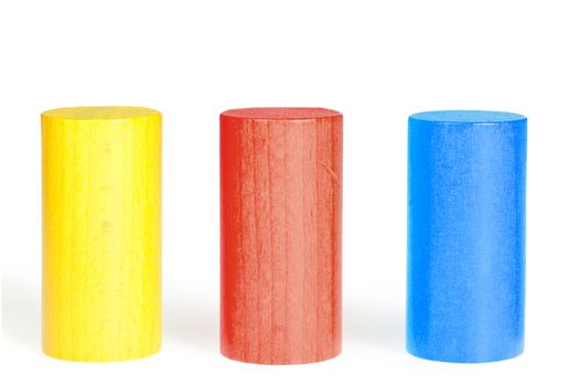 Wooden colour cylinders. It is isolated on a white background