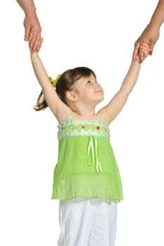 Happy pretty the little girl keeps for hands of parents. It is isolated on a white background