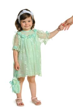 The little girl holds a hand of mother. It is isolated on a white background