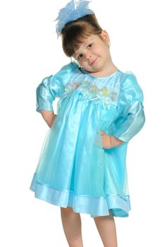 Pretty the little girl in a blue dress. It is isolated on a white background