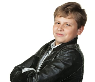 Portrait of the teenager in a leather jacket. It is isolated on a white background