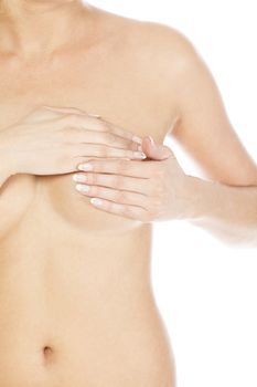 Breast cancer, woman holding her breast, isolated on white background