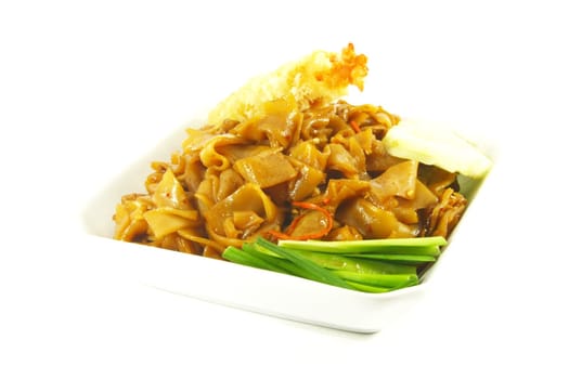 Stir Fried Asian Style Noodles On a White Plate