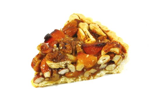Pecan Pie With Assorted Nuts and Caramel Isolated