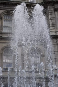 Water splashing in front of a building