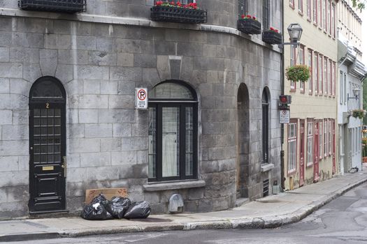Garbage day on a street corner of Old Quebec