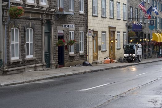 Street cleaner on garbage day in old quebec city