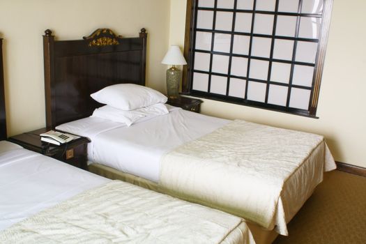 Generic Hotel Bed Room With Sunlight Coming In