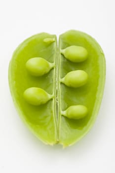 close-up fo opened green bean pod with selective focus