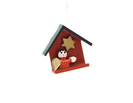 Wooden Christmas decoration witch represents bible themes isolated on white