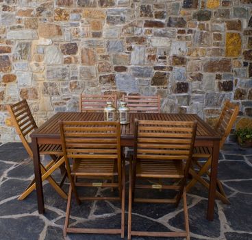 rustic terrace with table and chairs