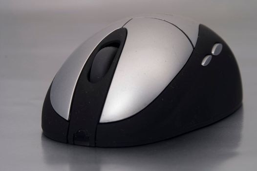 wireless mouse over grey background