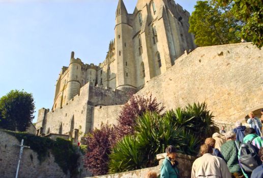 Mont Saint-Michel (English: Mount Saint Michael) is a rocky tidal island in Normandy, France. It is located approximately one kilometer off the country's north coast, at the mouth of the Couesnon River near Avranches.