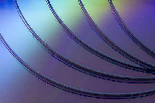 a stack of blank DVD or CD disks -  background