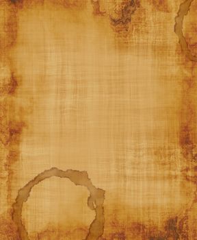 a large image of old and worn fabric or paper with coffee stain
