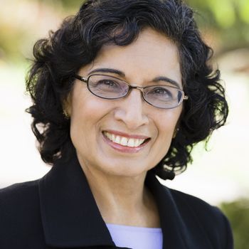 Portrait of an Indian Businesswoman Wearing Glasses Smiling Outdoors