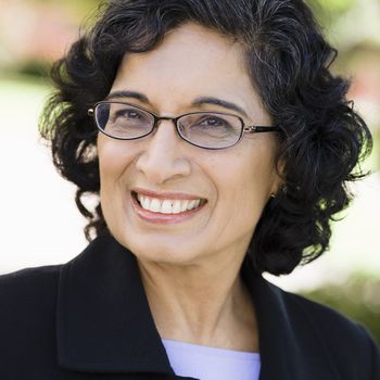Portrait of an Indian Businesswoman Wearing Glasses Smiling Outdoors