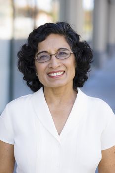 Portrait of Smiling Indian Businesswoman Looking Directly To Camera